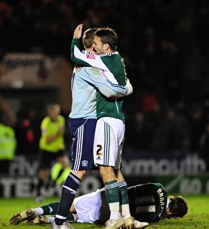 Images Dated 16th March 2010: Bristol City's Championship Victory: Duguid and Stockdale's Jubilant Moment at Plymouth Argyle's
