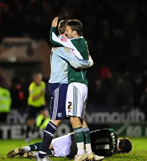 Framed Print : Bristol City's Championship Victory: Duguid and Stockdale's Jubilant Moment at Plymouth Argyle's Home Park Framed Print : Bristol City's Championship Victory: Duguid and Stockdale's Jubilant Moment at Plymouth Argyle's Home Park