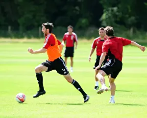 Pre-Season Training Prints: Bristol Citys Cole Skuse challenges for the ball with Bristol Citys Jamie McAllister