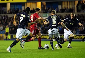 Millwall V Bristol City Prints: Bristol City's Cole Skuse Tackles Millwall's Defense - Championship Clash