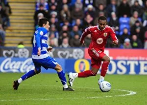 Images Dated 26th December 2010: Bristol City's Danny Rose Breezes Past Reading's Jem Karacan in Championship Clash