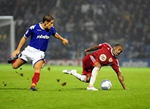 Images Dated 28th September 2010: Bristol City's Danny Rose Fouled by Michael Brown in Portsmouth vs