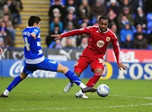 Images Dated 26th December 2010: Bristol City's Danny Rose Outmaneuvers Reading's Jem Karacan in Championship Clash - 26/12/2010