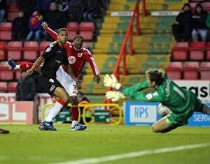 Images Dated 27th November 2010: Bristol City's Danny Rose Thwarted by Steve Simonsen: Championship Showdown between Bristol City