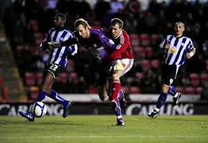 Bristol City's David Clarkson Battles Nicky Weaver: A Dramatic Moment from the FA Cup Match against Sheffield Wednesday (08/01/2011)