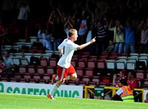 Images Dated 31st July 2010: Bristol City's David Clarkson Celebrates Goal Against Blackpool in 2010 Championship Match