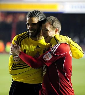 Images Dated 1st January 2011: Bristol City's David James and David Clarkson Celebrate Goal vs. Cardiff City (01.01.2011)