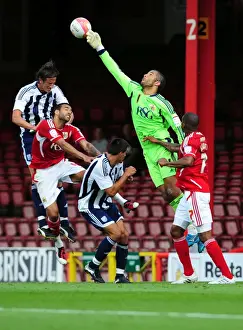 Season 11-12 Prints: Bristol City's David James Dives for the Championship-Winning High Ball vs