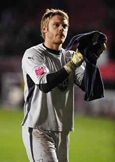 Images Dated 23rd March 2010: Bristol City's Dean Gerken in Action: Championship Clash vs Barnsley (23/03/2010)