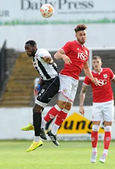 Bristol City's Derrick Williams Battles for a Header in Pre-Season Friendly against Bath City