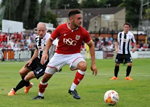 Bath V Bristol City Prints: Bristol City's Derrick Williams Faces Off Against Bath City's Dave Pratt in Pre-Season Friendly Clash