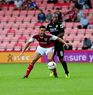 Bournemouth V Bristol City Prints: Bristol City's Derrick Williams Secures Ball from Wes Thomas in Pre-Season Clash at Bournemouth