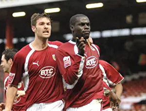 Bristol City's Enoch Showunmi and Jamie McCombe Clash in Action Against Barnsley