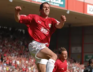 Promotion Prints: Bristol City's Euphoric Promotion to Championship: Alex Russell's Unforgettable Moment