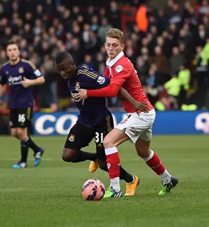 Bristol City V West Ham Prints: Bristol Citys George Saville tussles with West Hams Enner Valencia in the FA Cup