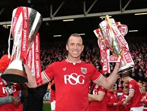 Images Dated 3rd May 2015: Bristol City's Glory: Aaron Wilbraham Lifts Sky Bet League One and JPT Trophies