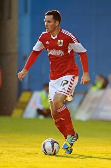 Images Dated 6th August 2013: Bristol City's Greg Cunningham in Action at Priestfield Stadium, 2013