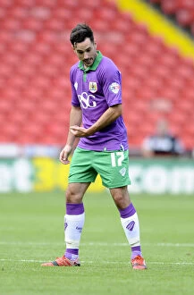 Images Dated 9th August 2014: Bristol City's Greg Cunningham in Action at Sheffield United's Bramal Lane
