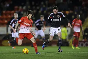 Leyton Prints: Bristol City's Greg Cunningham Challenges Leyton Orient's Romain Vincelot in Football Rivalry