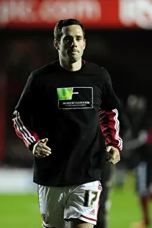 Images Dated 22nd October 2013: Bristol City's Greg Cunningham in Kick It Out Shirt during Bristol City vs Brentford Match