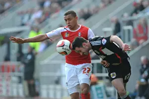 Bristol City's Greg Cunningham vs Rotherham United's James Tavernier: A Battle for the Ball in Sky Bet League One