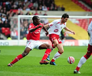 Nottingham Forest V Bristol City Prints: Bristol City's Ivan Sproule in a Tight Battle with Nottingham Forest's Guy Moussi