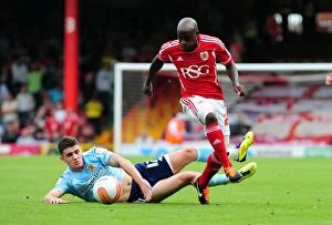 Images Dated 24th September 2011: Bristol City's Jamal Campbell-Ryce Outsmarts Hull City's Robert Brady in Championship Match