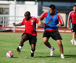 Bristol Citys Jamal Camplbell-Ryce battles for the ball with Bristol Citys Bradley Orr