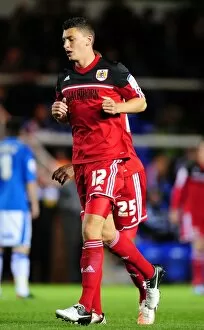Images Dated 18th September 2012: Bristol City's James Wilson Faces Off Against Peterborough United in Championship Clash