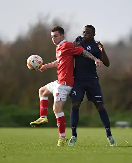 Bristol City's Jamie Horgan Fends Off Millwall's Josh Siafa in U21 PDL2 Clash