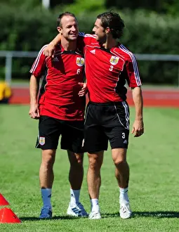 Bristol Citys Jamie McAllister with Bristol City Captain, Louis Carey