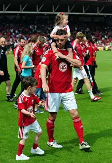 Bristol City's Jamie McAllister Celebrates Championship Victory with Family at Ashton Gate Stadium (07/05/2011)