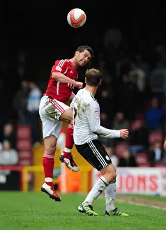 Bristol City V Derby County Prints: Bristol City's Jamie McAllister Wins the High Ball in Thrilling Derby County Match