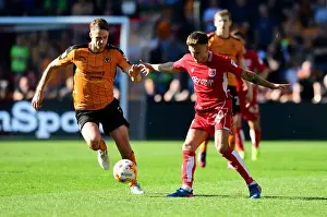 Bristol City V Wolverhampton Wanderers Prints: Bristol City's Jamie Paterson Dribbles Past Wolverhampton Wanderers David Edwards in Championship Clash