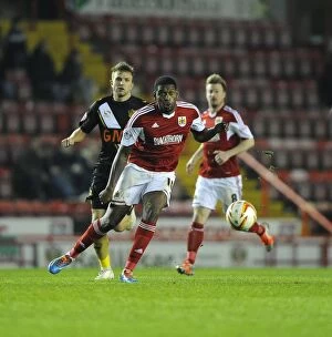 Images Dated 25th March 2014: Bristol City's Jay Emmanuel-Thomas in Action Against Rivals - Sky Bet League One, Ashton Gate