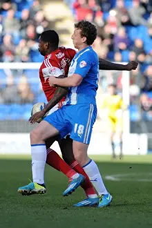 Bristol City's Jay Emmanuel-Thomas Fends Off Tom Eastman of Colchester United