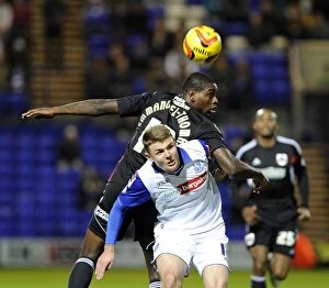 Images Dated 16th November 2013: Bristol City's Jay Emmanuel-Thomas Fights for the Header in Tranmere vs