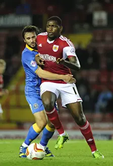 Bristol City V Shrewsbury Town Prints: Bristol City's Jay Emmanuel-Thomas Foul by Aaron Wildig during Bristol City vs Shrewsbury Town