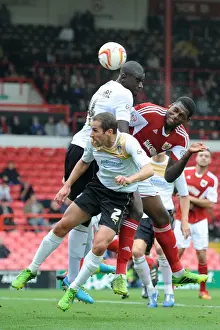 Bristol City's Jay Emmanuel-Thomas Leaps for a Header in Sky Bet League One Clash Against Colchester United