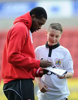 Bristol City's Jay Emmanuel-Thomas and Mascot Celebrate at Swindon Town's County Ground