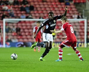Images Dated 24th September 2013: Bristol City's Jay Emmanuel-Thomas and Stephen McLaughlin Exchange a One-Two at Southampton's St