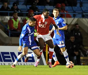 Bristol City's Jay Emmanuel-Thomas vs Gillingham's Joe Martin: FA Cup Clash at Priestfield Stadium (November 8, 2014)