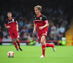 Louis Carey Testimonial Prints: Bristol City's Joe Bryan in Action at Louis Carey's Testimonial