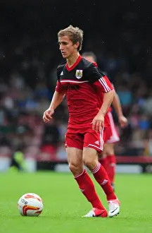 Louis Carey Testimonial Prints: Bristol City's Joe Bryan in Action at Louis Carey's Testimonial