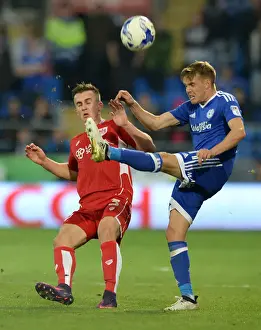 Bristol City's Joe Bryan Battles Craig Noone of Cardiff City in Championship Clash