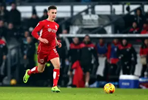 Bristol City's Joe Bryan Bolts Past Defenders in Derby County Showdown