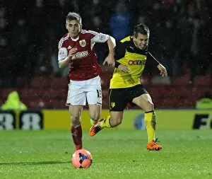 Images Dated 14th January 2014: Bristol City's Joe Bryan Charges Down the Wing in FA Cup Third Round Replay at Vicarage Road