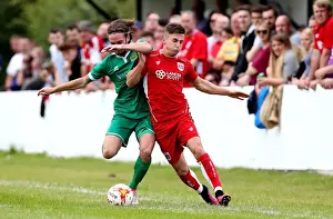 Bristol City's Joe Bryan Faces Off Against Hengrove Athletic's Asa White in Pre-Season Friendly