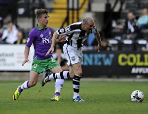 Images Dated 31st August 2014: Bristol City's Joe Bryan Faces Off Against Notts County's Gary Jones in Sky Bet League One Clash