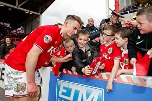 Images Dated 5th March 2016: Bristol City's Joe Bryan Greets Young Fans After Bristol City vs. Cardiff City Match